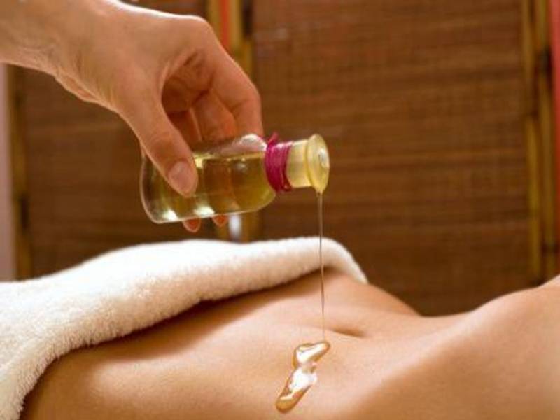 massage à l'huile d'harpagophytum